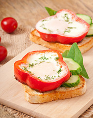 scrambled in sweet pepper on toast with greens