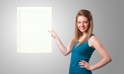 Young woman holding white paper copy space with diagonal lines