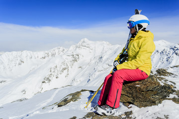 Ski - female skier  enjoying  panoramic view