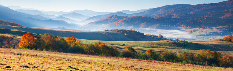 Colorful autumn panorama of the mountains.