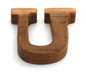 Alphabet made from wood on white