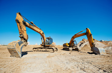 track-type loader excavators at work