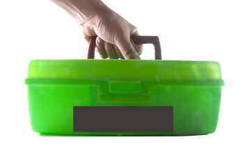 green  toolbox in a man's hand