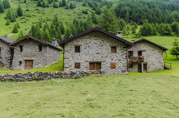 Fototapeta na wymiar Stone houses. Traditional alpine village in the mountains