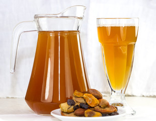 jar of berry drink on the wooden table