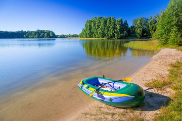 Inflatable dinghy at the summer lake in Poland
