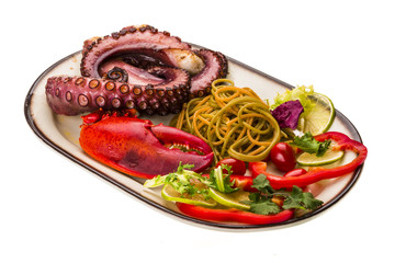 Seafood pasta with octopus and lobster leg