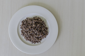 brown rice in white plate