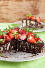 Marble cake with chocolate glaze and strawberries