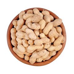 Peanuts in a wooden bowl on a white background