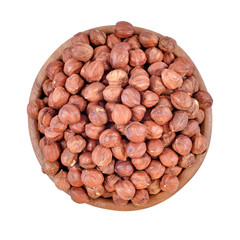 Peeled hazelnuts in a wooden bowl on a white background