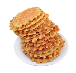 Pile of sweet waffles on a plate.