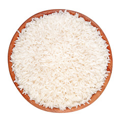 Uncooked rice in a wooden bowl on a white background