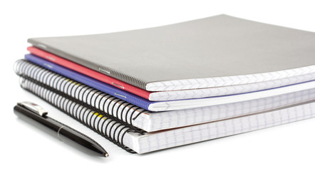 Notebook stack and pencils. Schoolchild and student studies acce