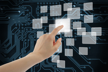 Woman hand using touch screen interface 