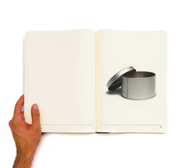 Open and empty steel box printed on white book.