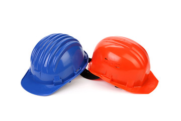 Fototapeta premium Hard hat of different colors like yin and yang.