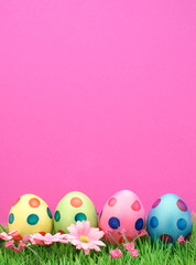 Fototapeta na wymiar Cute easter eggs with pink background