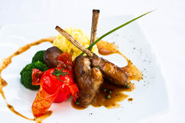 lamb steak  on white plate