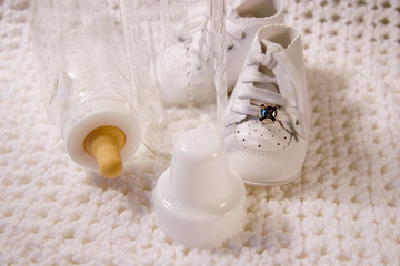 Baby Shoes and Bottle