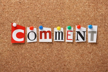 The word Comment on a cork notice board