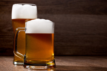 Two glass beer on wooden table