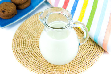 Glass jug of fresh milk