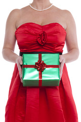 Woman holding gift wrapped present.
