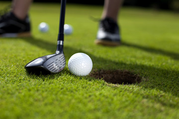 Closeup of hole on golf field