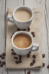 Coffee beans with coffee cup