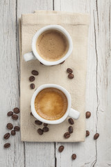 Coffee beans with coffee cup