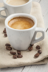 Coffee beans with coffee cup