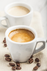 Coffee beans with coffee cup