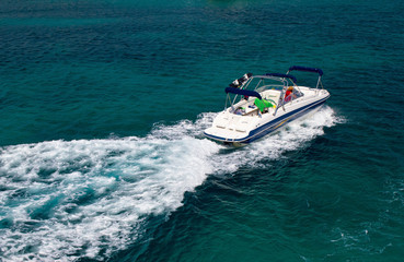 Powerboat on blue open water