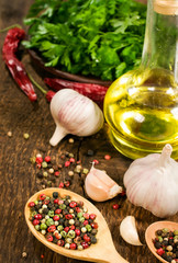 still life with garlic, vegetable oil and spices