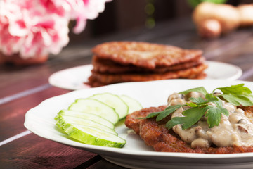 Potato pancakes with mushroom sauce