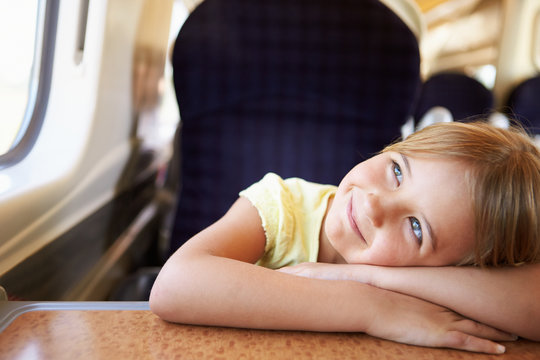 Girl Relaxing On Train Journey
