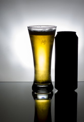 glass and a can of beer isolated