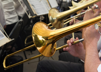 Obraz na płótnie Canvas musician plays the trumpet in the orchestra