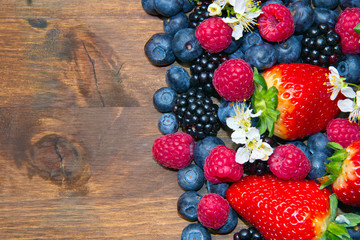 Berries on Wooden Background