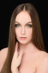 Obraz premium girl with long hair posing black background