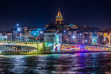 View of Istanbul and Galata tower and bridge at night - Powered by Adobe