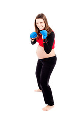 Pregnant Smiling Young Woman Wearing Boxing Gloves