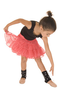 Young Girl Bending Over Reaching To Touch Her Toes