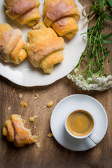 Breakfast with espresso and a croissant
