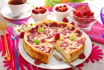 Foto op Plexiglas cheesecake with raspberries and almonds © teressa