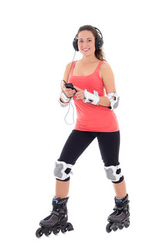 attractive woman in roller skates listening music on white backg