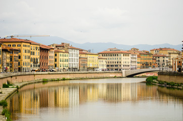 Fototapeta na wymiar View of Pisa city center building with Arno river