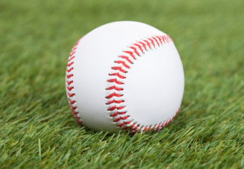 Baseball On Green Pitch
