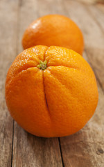 orange on wooden background